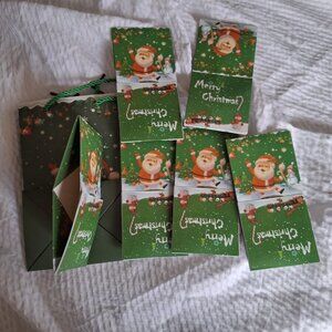 santa merry christmas gift bag and surprise boxes